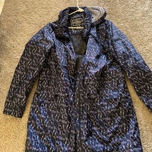 Woman’s hooded rain jacket